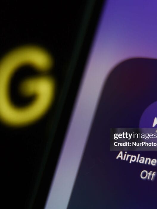 Airplane Mode icon displayed on a phone screen and 5G sign displayed on a screen are seen in this illustration photo taken in Krakow, Poland on December 6, 2022. (Photo by Jakub Porzycki/NurPhoto via Getty Images)