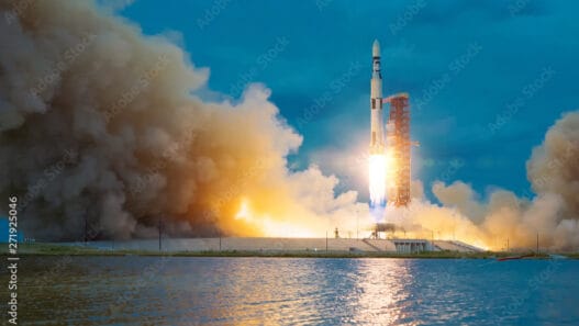 Rocket takes off into the sky. Lots of smoke and gas. The elements of this image furnished by NASA.