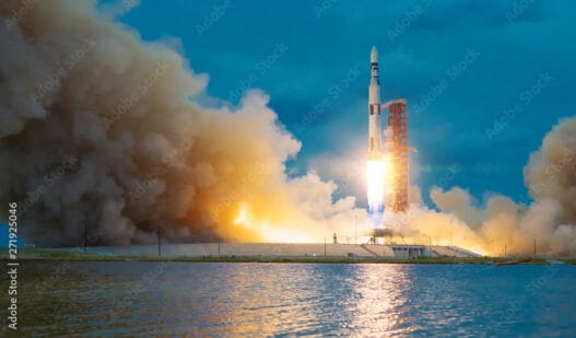 Rocket takes off into the sky. Lots of smoke and gas. The elements of this image furnished by NASA.